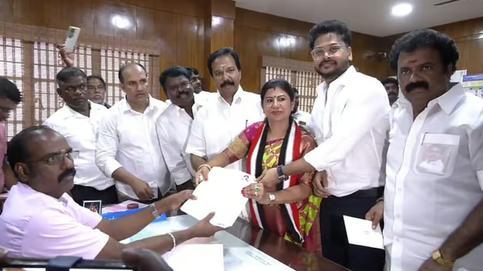 Jayalalithaa with lottery ban statement vs. Santiago Martin representing lottery business.