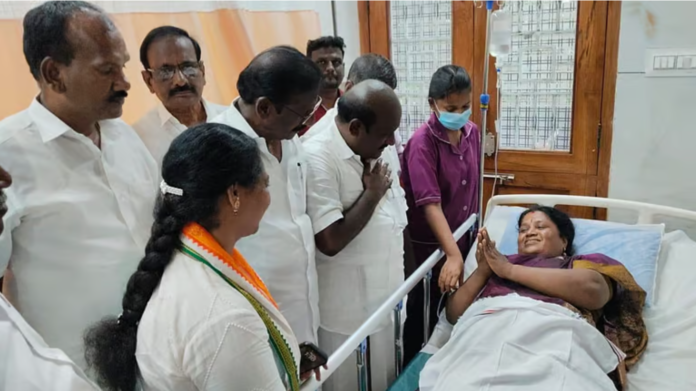வெயிலில் மயங்கிய அதிமுக வேட்பாளரை மருத்துவமனையில் நலம் விசாரிக்கும் திமுக அமைச்சர் கோவி.செழியன்.