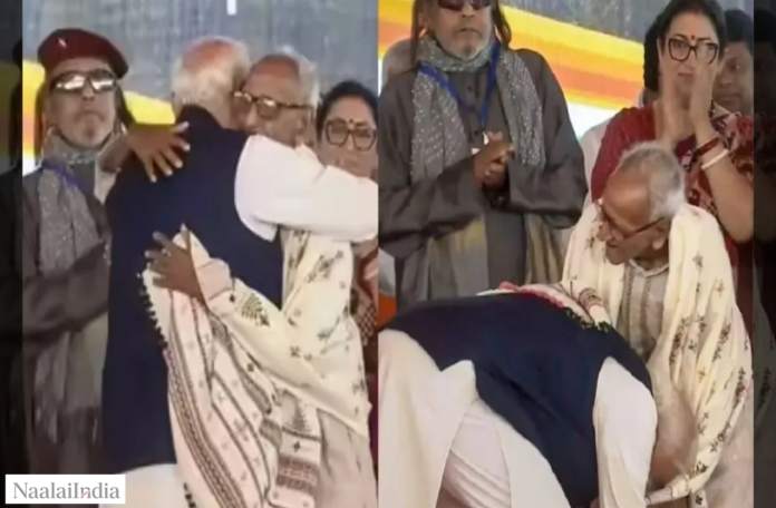 மேற்கு வங்க முதலமைச்சர் பதவியேற்பு விழாவில் பிரதமர் மோடி மூத்த பாஜக தொண்டர் மக்னலால் சர்க்காரின் காலில் விழுந்து வணங்குகிறார்.